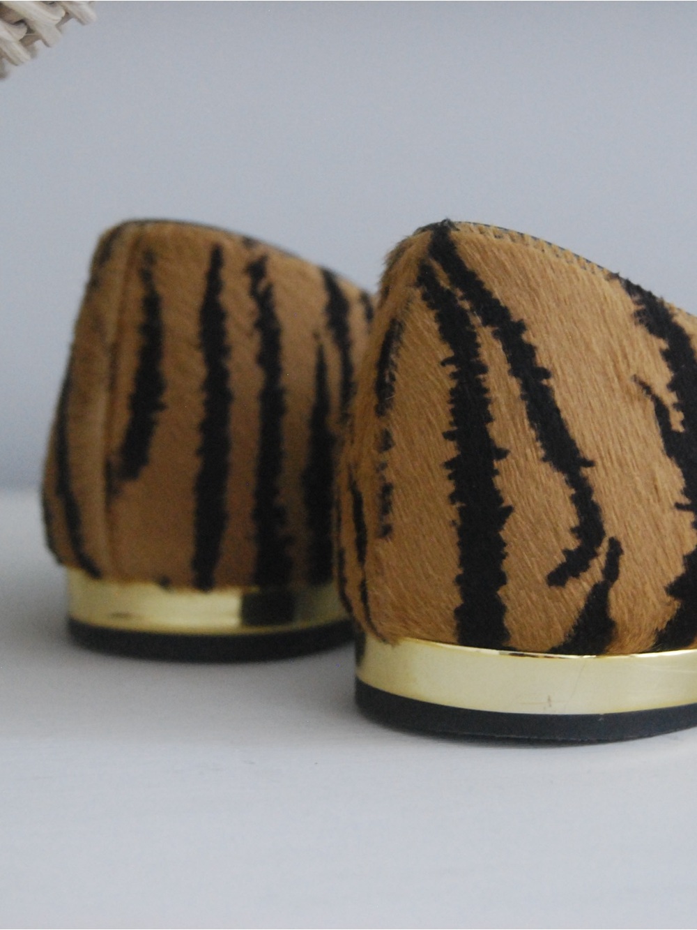 Aquazzura Tiger-Print Slip-On Flats in Brown and Black